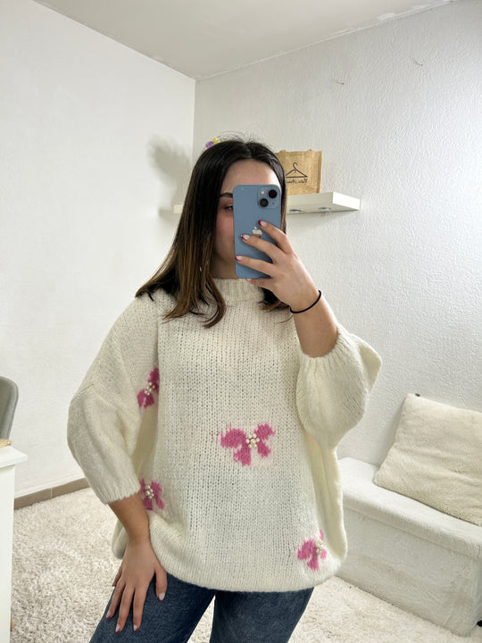 Pull avec motifs à noeuds et perles